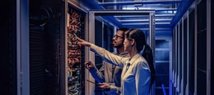 IT professionals in a server room